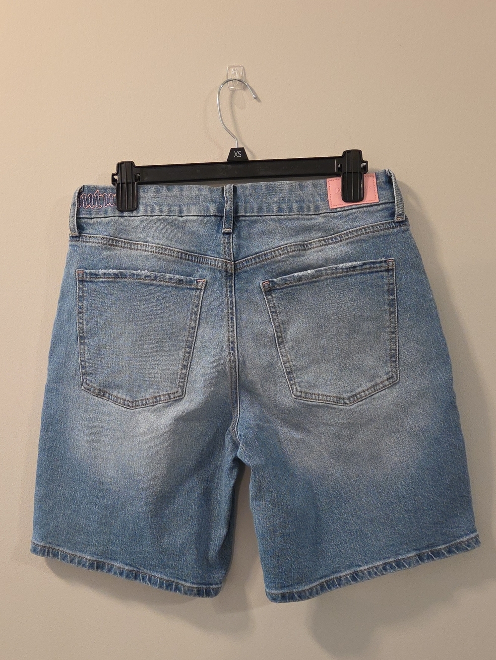Light-wash denim shorts by Juicy Couture featuring a classic mid-rise - Picture 3 of 5